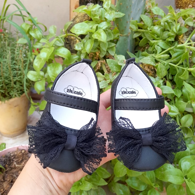 کفش نوزادی چرم رنگ‌مشکی مناسب نوزاد